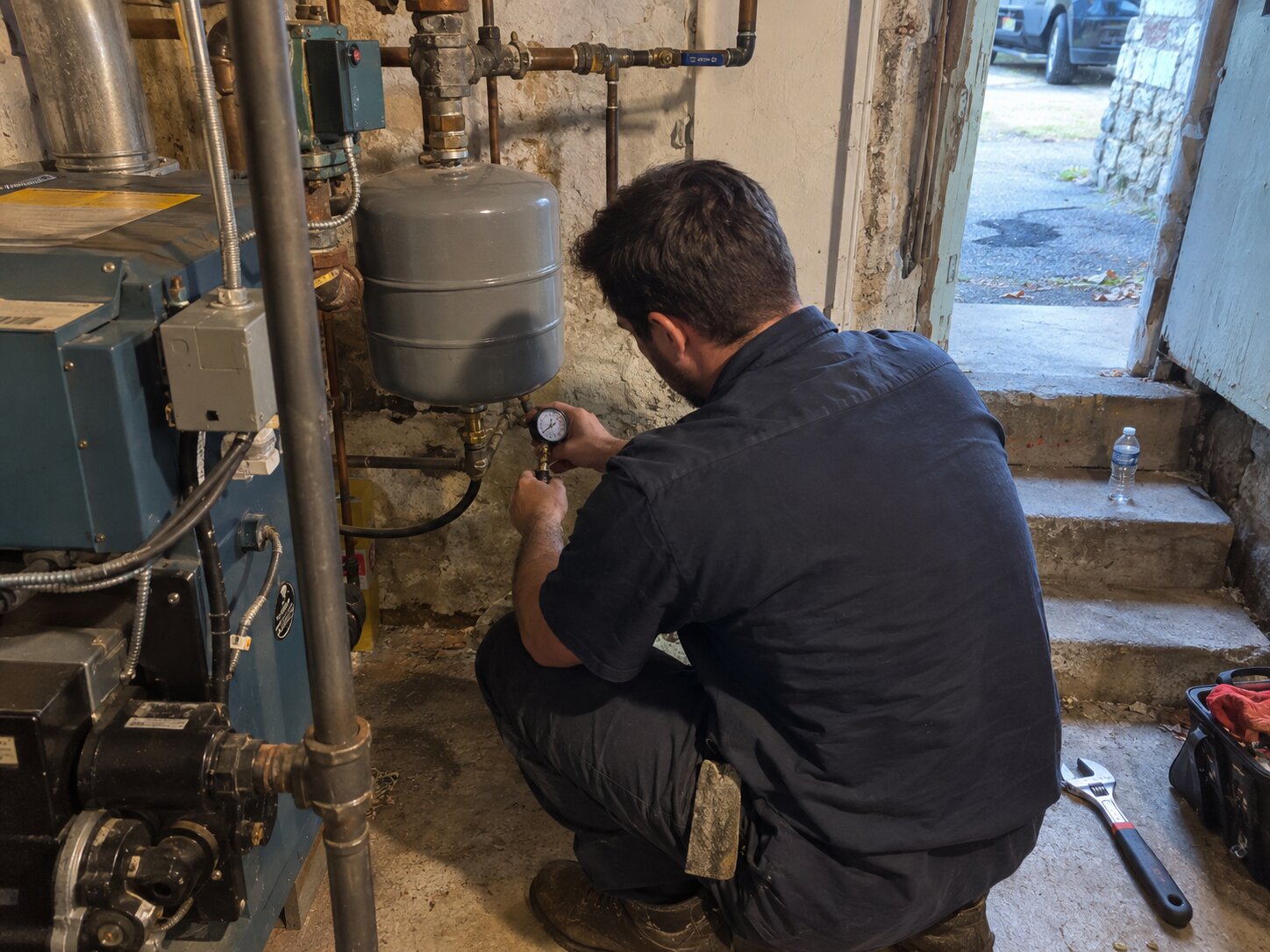 Testing boiler expansion tank pressure by Lexington Heating and Air
