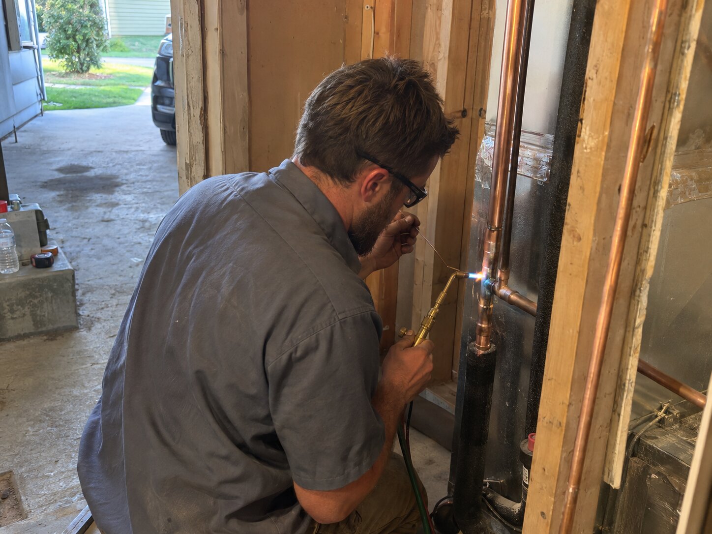 Brazing refrigerant lines during an AC installation by Lexington Heating and Air