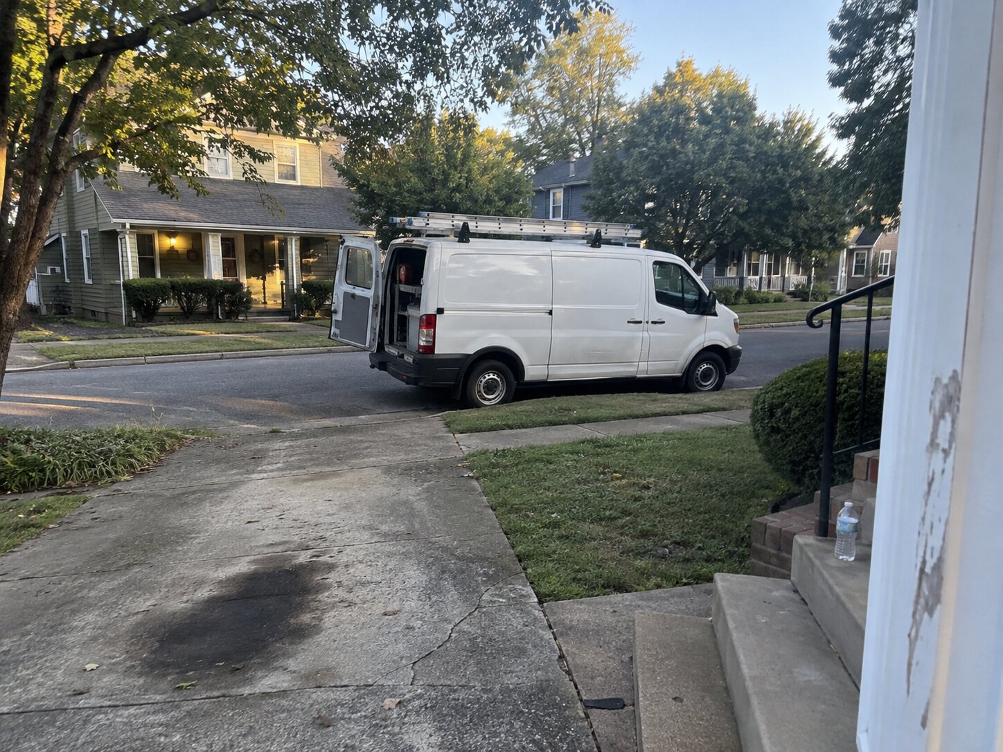 Work truck parked on a residential street in Wilmore Ky by Lexington Heating and Air